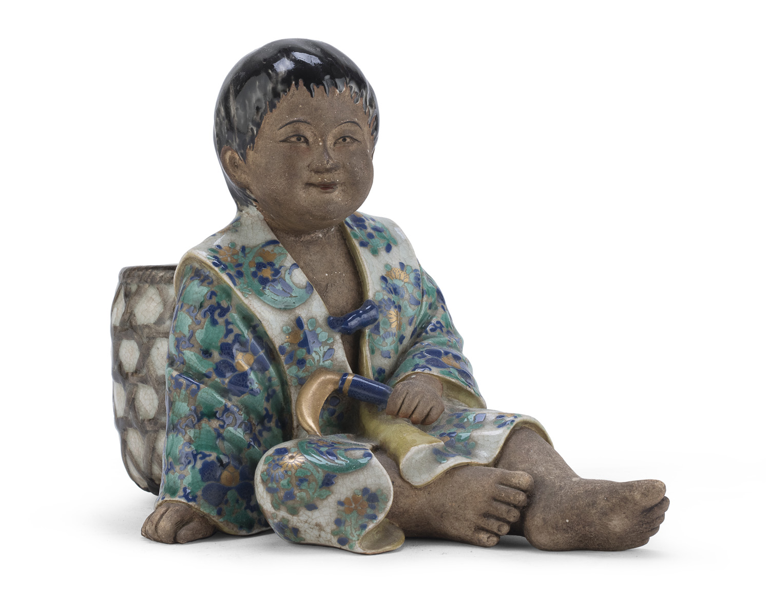 A JAPANESE POLYCHROME CERAMIC OKIMONO DEPICTING CHILD. KYOTO MANUFACTURE 19TH CENTURY.