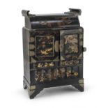 A JAPANESE BLACK LAQUER AND GOLD LAQUER WOOD CABINET. EARLY 20TH CENTURY. DEFECTS.