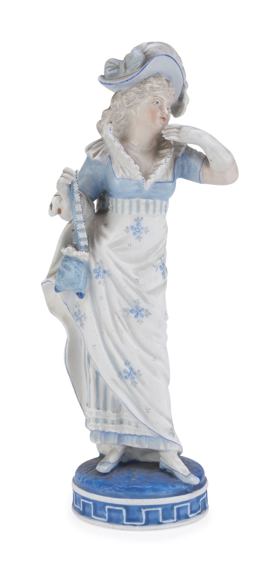 PORCELAIN SCULPTURE OF A WOMAN WITH UMBRELLA PROBABLY GERMANY LATE 19TH CENTURY