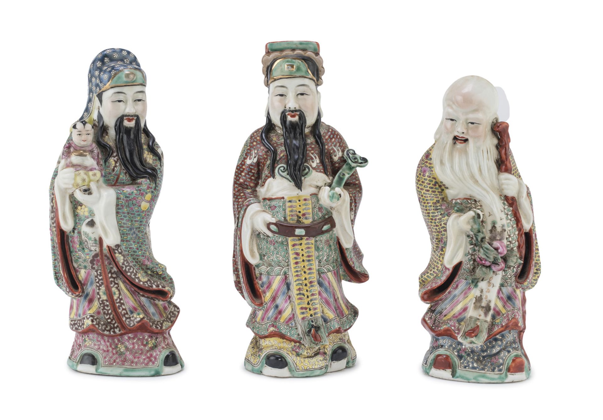 THREE CHINESE POLYCHROME PORCELAIN SCULPTURES OF FU LU SHOU FIRST HALF 20TH CENTURY.