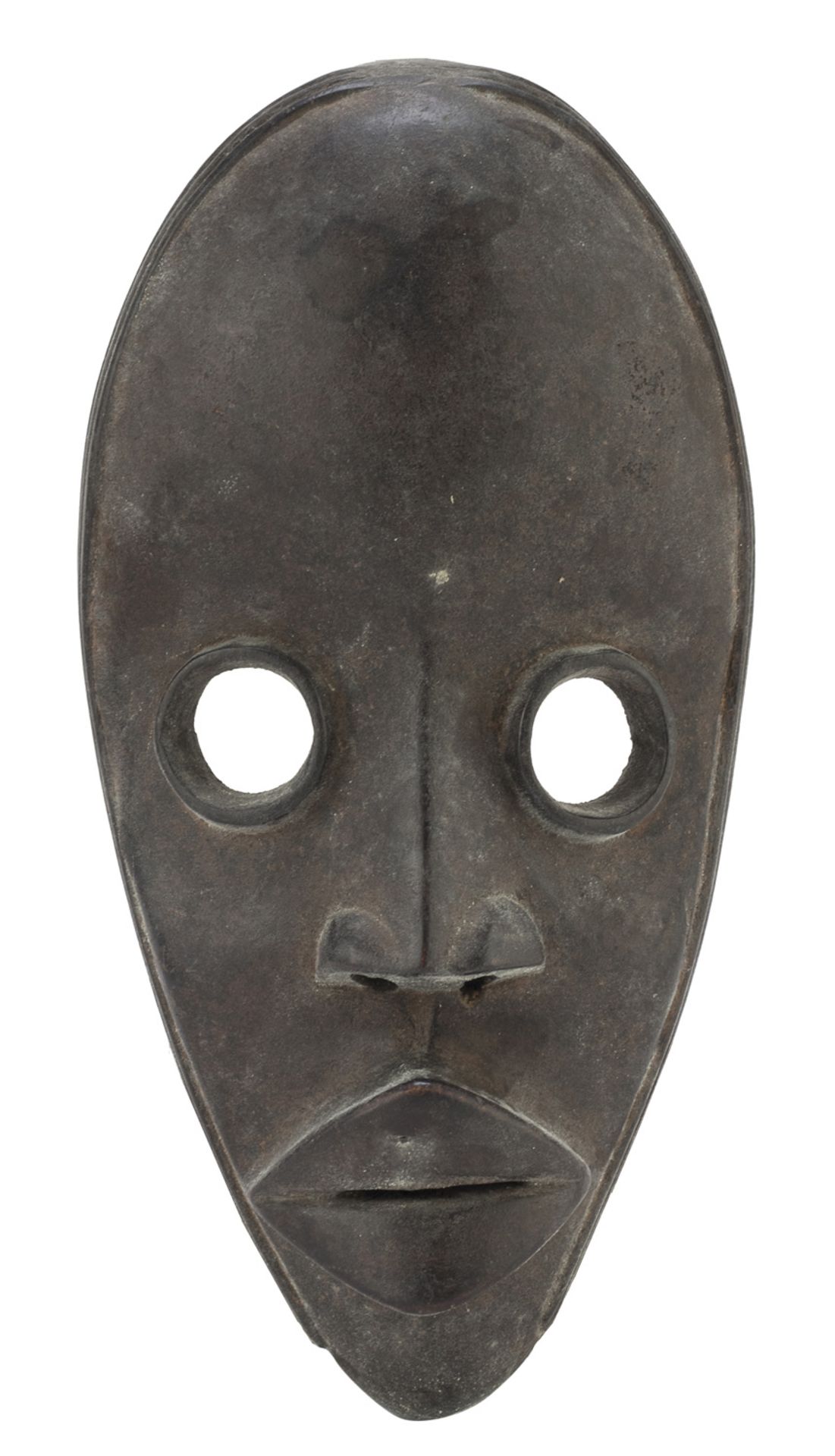 AN AFRICAN IVORY COAST WOODEN DAN CULTURE MASK. 20TH CENTURY.