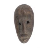 AN AFRICAN FANG MASK 20TH CENTURY.