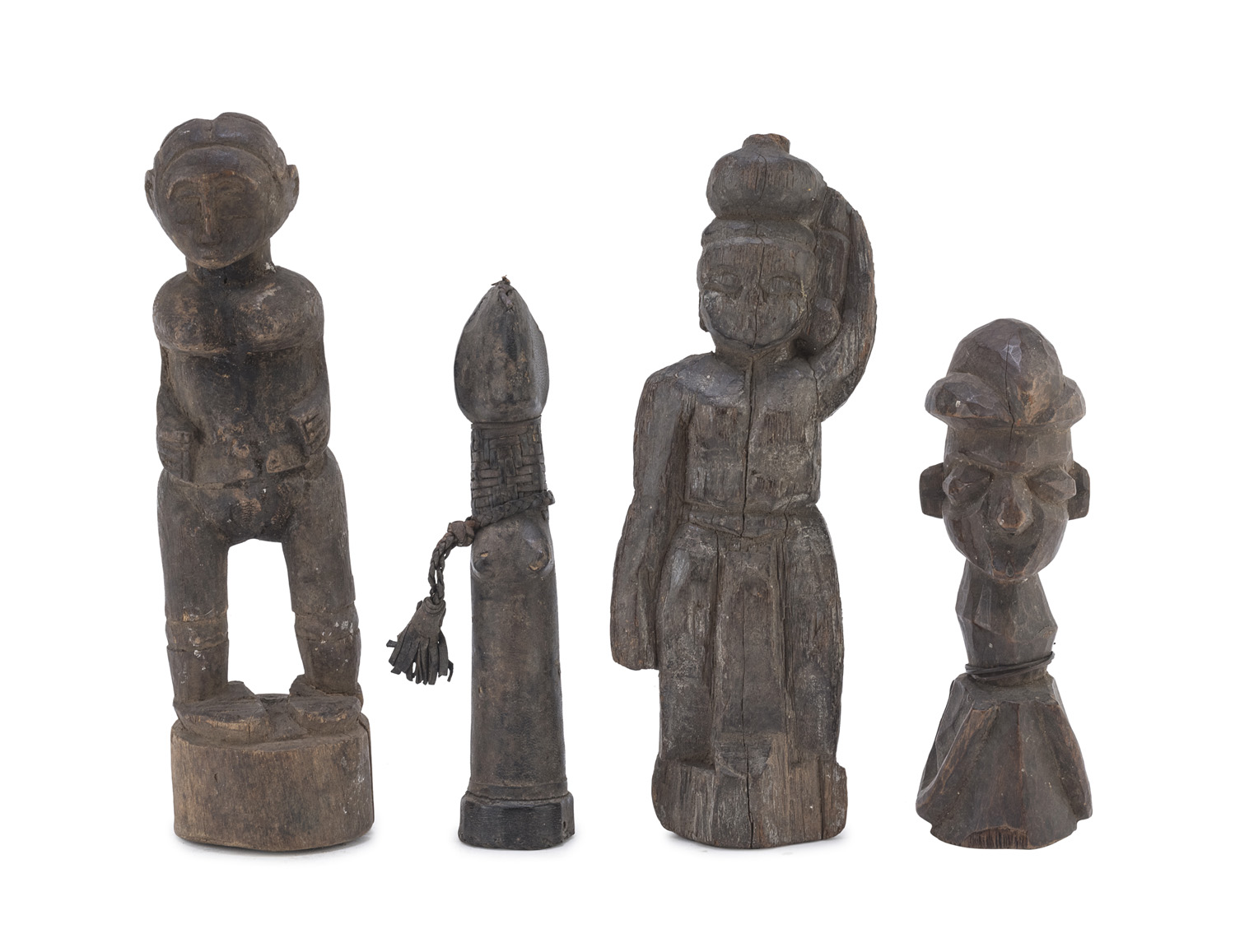 FOUR AFRICAN WOOD SCULPTURES DEPICTING ANCESTOR. 20TH CENTURY.