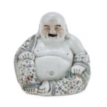 A CHINESE PORCELAIN SCULPTURE OF BUDDHA 20TH CENTURY.