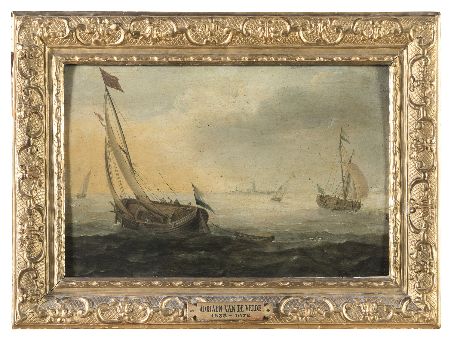 OIL PAINTING OF A SEASCAPE WITH SAILING BOATS FROM THE WORKSHOP OF WILLEM VAN DE VELDE (1633-1707)