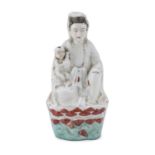 A CHINESE POLYCHROME PORCELAIN SCULPTURE OF GUANYIN 20TH CENTURY.