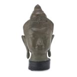 A CAMBODIAN BRONZE HEAD OF BUDDHA 20TH CENTURY