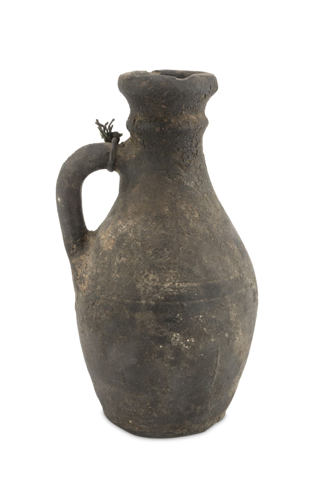 A PERSIAN EARTHERNWARE PITCHER 2ND CENTURY B.C. - 2ND CENTURY A.C.