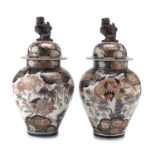 A PAIR OF FRENCH POLYCHROME AND GOLD ENAMELED PORCELAIN VASES. IMARI STYLE 19TH CENTURY.