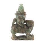 A CHINESE FLUORITE GROUP DEPICTING A BUDDHIST LION. 20TH CENTURY.