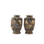 A PAIR OF JAPANESE POLYCHROME AND GOLD ENAMELED CERAMIC VASES LATE 19TH EARLY 20TH CENTURY.
