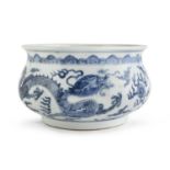 A CHINESE WHITE AND BLUE PORCELAIN CACHEPOT EARLY 20TH CENTURY.