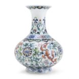 A CHINESE POLYCHROME ENAMELED PORCELAIN VASE 20TH CENTURY.