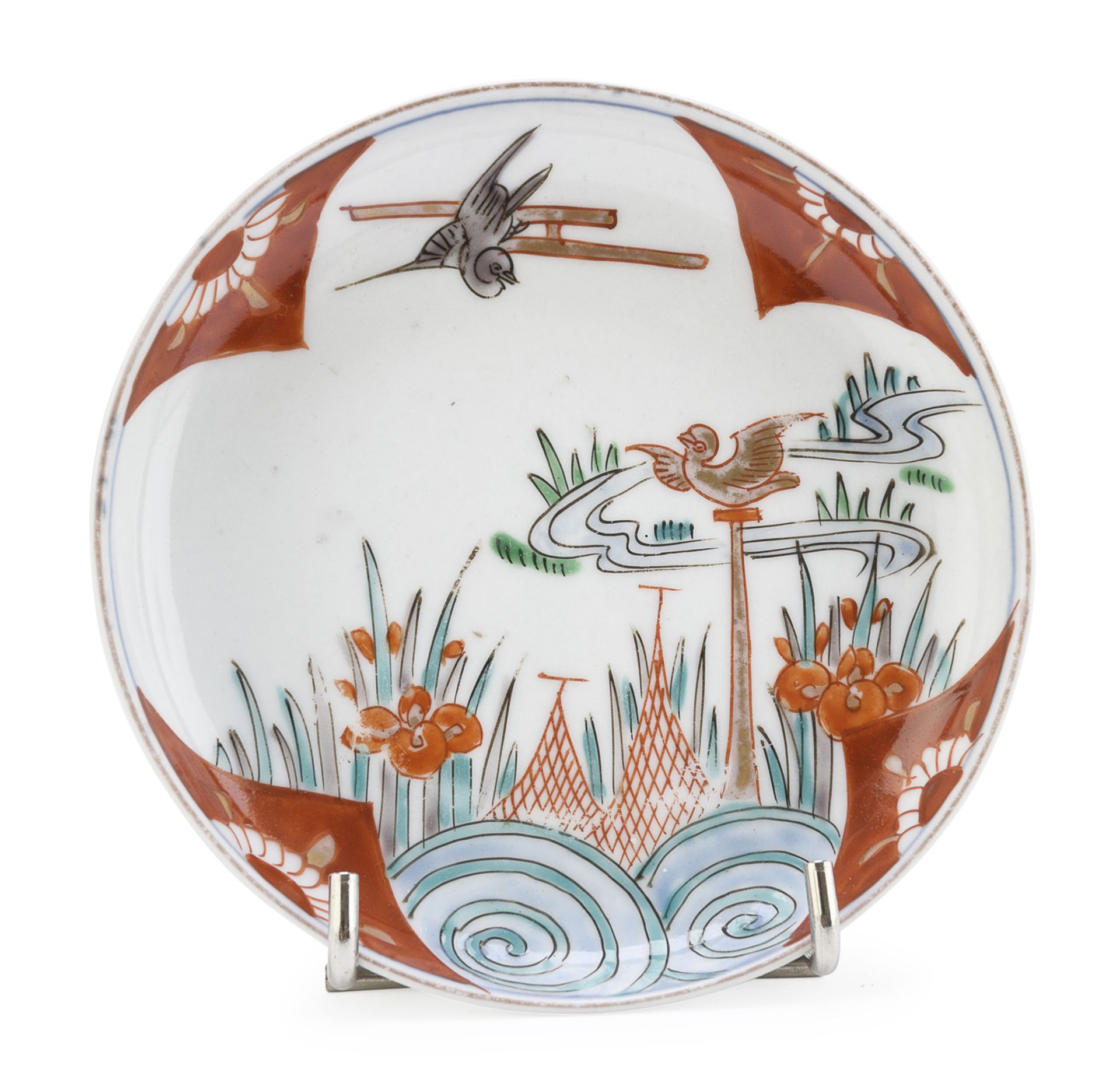 A JAPANESE POLYCHROME ENAMELED PORCELAIN SAUCER SECOND HALF 19TH CENTURY.