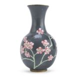 A CHINESE POLYCHROME ENAMELED METAL VASE 20TH CENTURY.