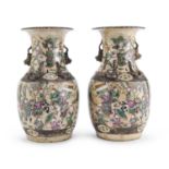 A PAIR OF CHINESE POLYCHROME ENAMELED VASES FIRST HALF 20TH CENTURY.