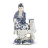 A CHINESE WHITE AND BLUE PORCELAIN SCULPTURE OF GUANYIN FIRST HALF 20TH CENTURY.