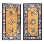 A PAIR OF CHINESE BEIJING BED RUGS EARLY 20TH CENTURY.
