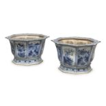 A PAIR OF CHINESE WHITE AND BLUE PORCELAIN CACHEPOTS 19TH CENTURY.
