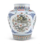 A CHINESE POLYCHROME ENAMELED PORCELAIN JAR 19TH CENTURY.