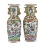 A PAIR OF CHINESE POLYCHROME AND GOLD ENAMELED PORCELAIN VASES 19TH - 20TH CENTURY. HAIRLINE