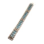 WHITE GOLD BRACELET WITH DIAMOND PAVE AND THIRTY-SIX AQUAMARINES