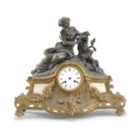 TABLE CLOCK IN GILDED AND BURNISHED METAL LATE 19th CENTURY