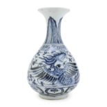 A CHINESE WHITE AND BLUE PORCELAIN VASE 19TH CENTURY.