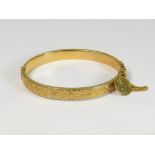 GOLD BANGLE.