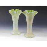 ART NOUVEAU VASES. A pair of green & opaline Art Nouveau glass vases. Height 26cm.
