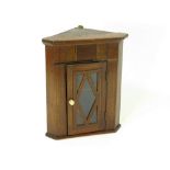 MINIATURE CORNER CUPBOARD.