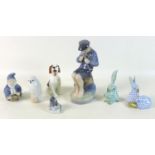 A group of seven ceramic figurines, comprising a Herend figurine, modelled as two rabbits, painted