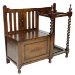 A mid 20th century stained oak hall stand, with integral seat and four division stick rack, 96.5