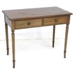 A modern oak side table, by David Bailes of Knaresborough, in Victorian style, with two frieze