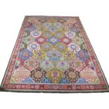 A mid 20th century carpet, ?Lomond? brand, number 1204, with red ground and multiple square set