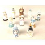 A collection of ten Royal Worcester porcelain snuffers, comprising Punch, 9cm, Budge, 10.5cm, Old