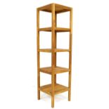 A wooden freestanding pot shelf, five slatted square shelves, 37 by 37 by 140cm high.