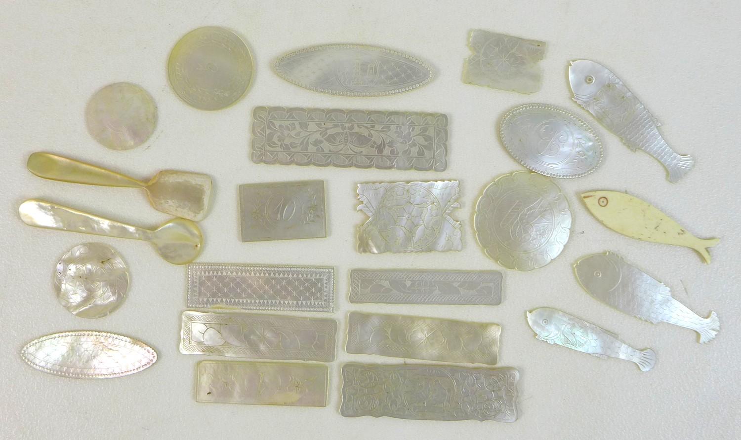 A collection of 19th century and later carved mother of pearl gaming counters, including Chinese