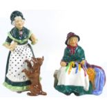 Two Royal Doulton figurines, modelled as 'Silks and Ribbons', HN2017, and 'Old Mother Hubbard',