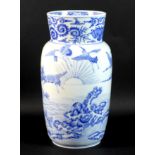 A Japanese Meiji Period porcelain lantern vase, finely decorated in underglaze blue with nine cranes