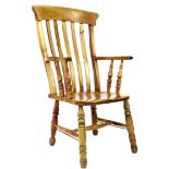 A 19th century slat back Windsor armchair, H stretcher with metal rod reinforcements, 59 by 62 by