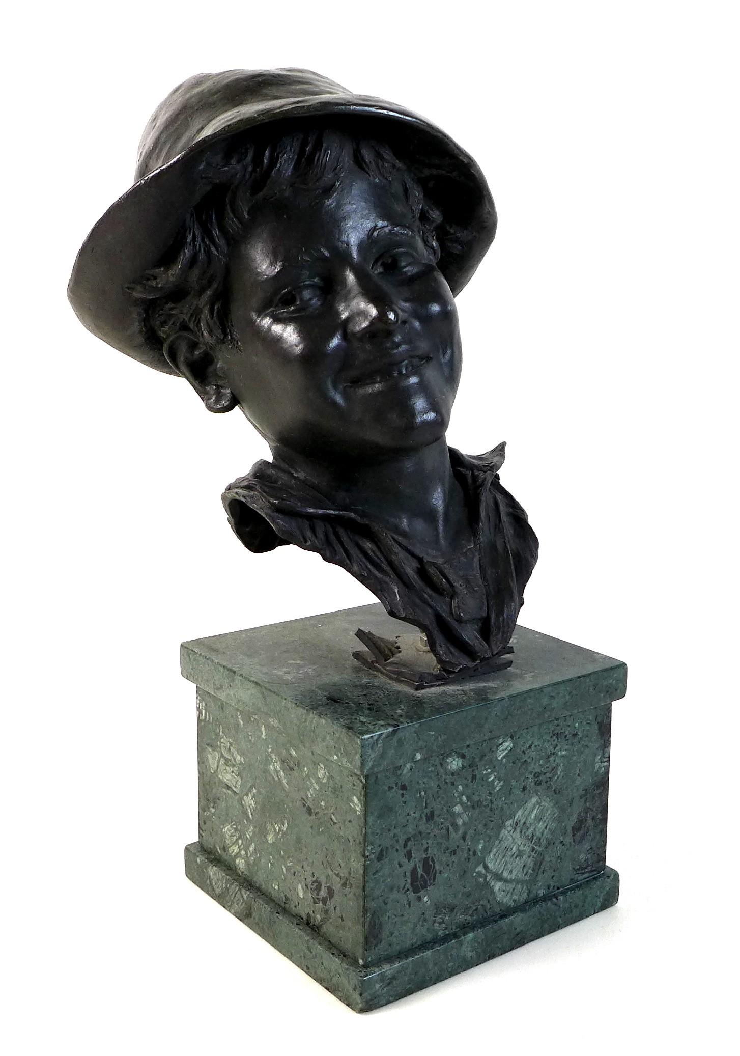 A large bronze bust of a Neapolitan man wearing a hat, with dark green patina, Italian, unsigned but