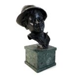 A large bronze bust of a Neapolitan man wearing a hat, with dark green patina, Italian, unsigned but