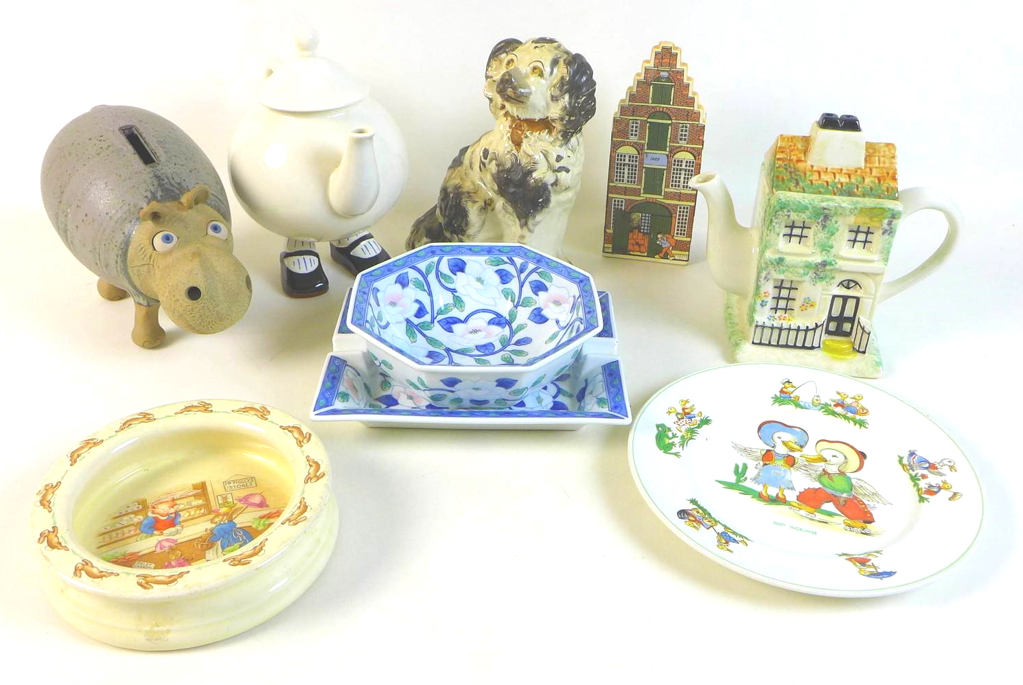A collection of ceramics comprising, a Staffordshire spaniel, 19cm high, an octagonal, John Jenkins,