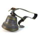 A French cast metal cow bell, 'Puy Mary', with wide leather strap.