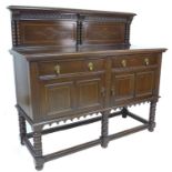 An Edwardian oak sideboard, with inlaid decoration, two drawers and two cupboards, 152.5 by 60.5