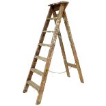 A vintage wooden step ladder, 47 by 11 by 165cm high.