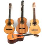 Four nylon strung classical style guitars, comprising a Sierra full size, a Constanta 3/4 size, an