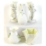 A collection of Belleek pottery, comprising Girl Basket Bearer and Boy Basket Bearer (a/f chip to