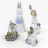 A group of four ceramic figurines, comprising a Nao figurine of a girl holding aloft a lantern, 505,